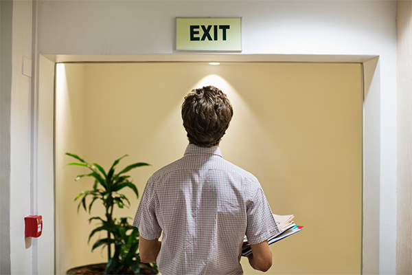 Employee reviewing exit route